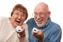 Older couple playing Wii video game