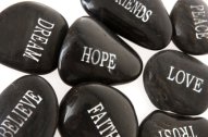 Image of inspirational words on pebbles